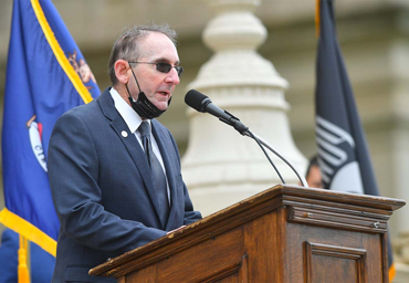 Tommy Brann speaking outside the Capitol building.